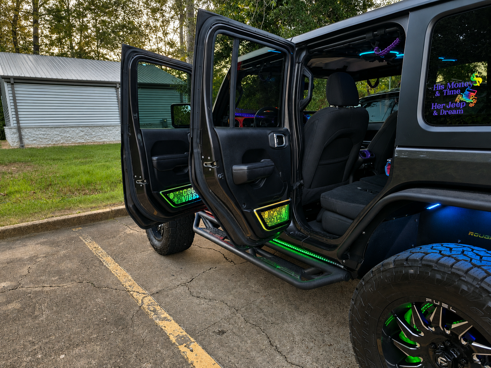 Lit FX custom engraved LED door-pocket delete four-piece set installed on a Jeep Wrangler JLU