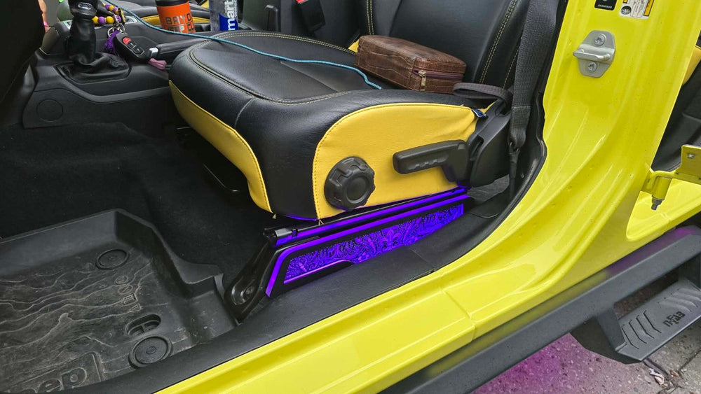 Lit FX Jeep JL JT front seat side covers installed in a yellow Jeep
