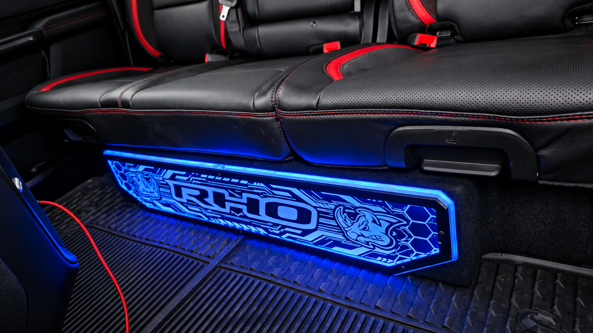 Lit FX illuminated RHO plaque installed on RAM KICKER truck enclosure