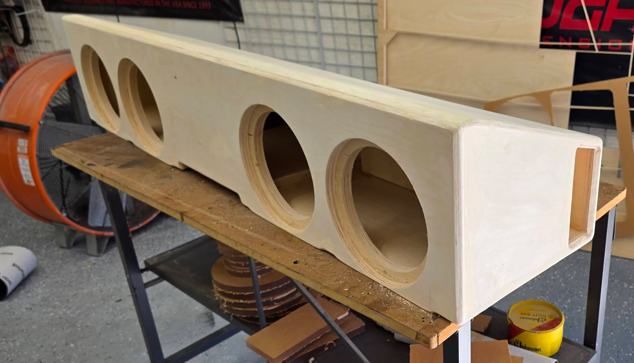 Chevrolet four 8-inch bare-wood under-seat enclosure detail