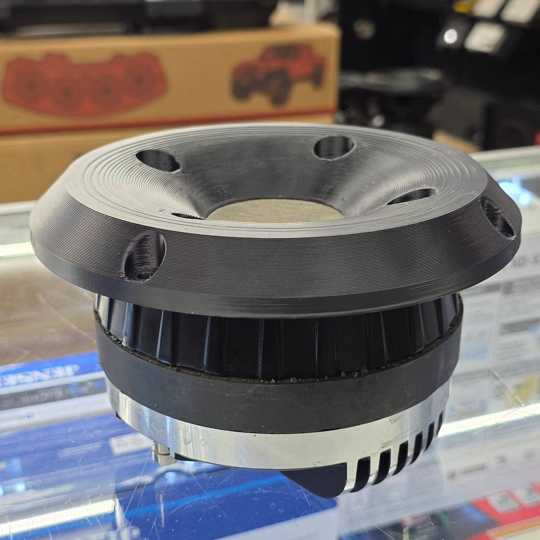 SMS Precision 6.5-inch adapter fitted to a 2-inch four-bolt compression driver, angled view