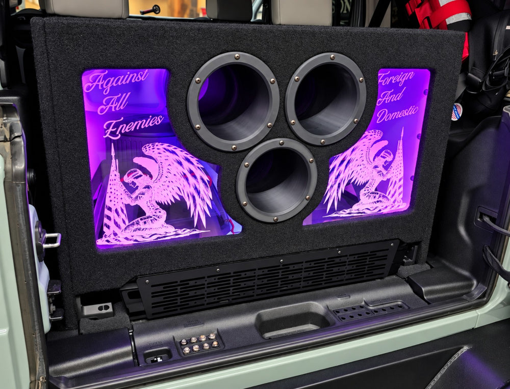SMS Precision dual-flared aero ports installed in a custom car-audio enclosure