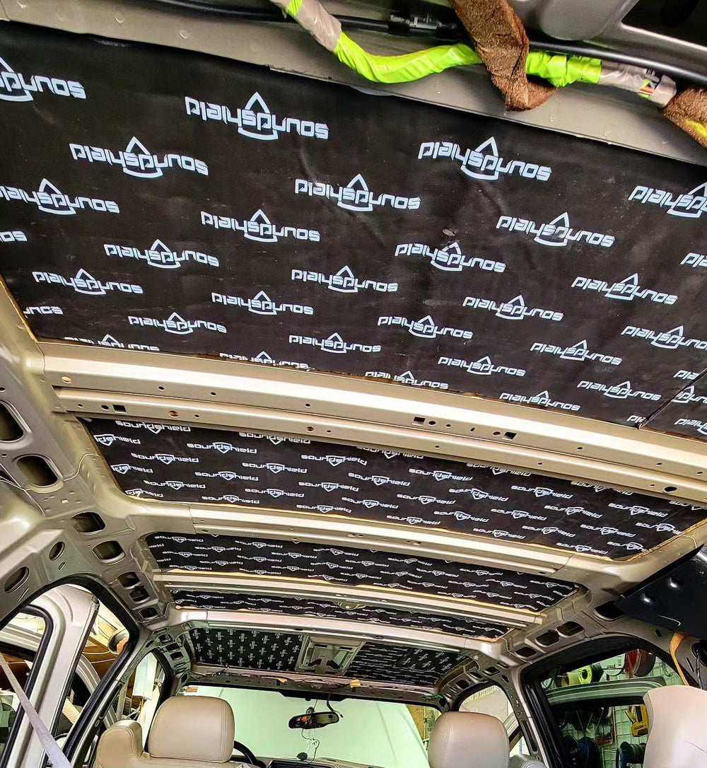 Vehicle roof sound-deadening treatment installed by SMS Car Audio to reduce bass-related panel vibration