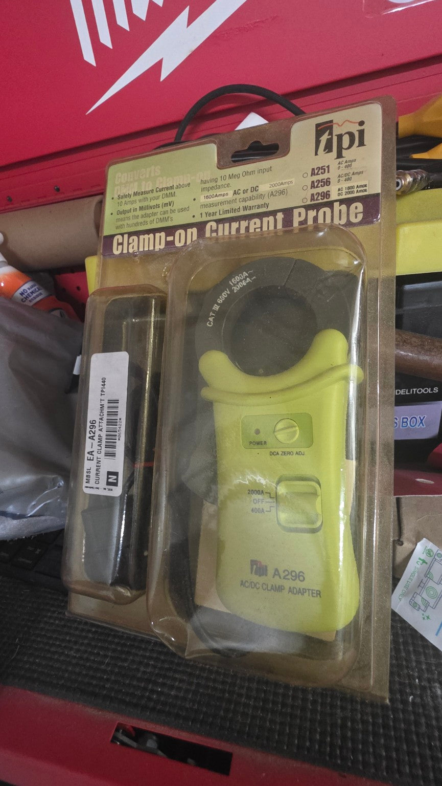 Actual unused TPI A296 AC/DC clamp-on current probe adapter in original shelf-worn packaging