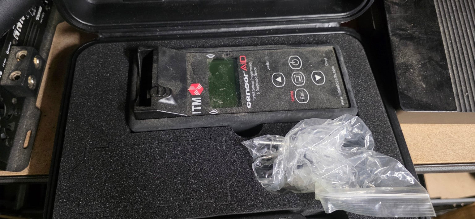 Used ITM SensorAID 08001 TPMS programming tool inside hard case with accessories