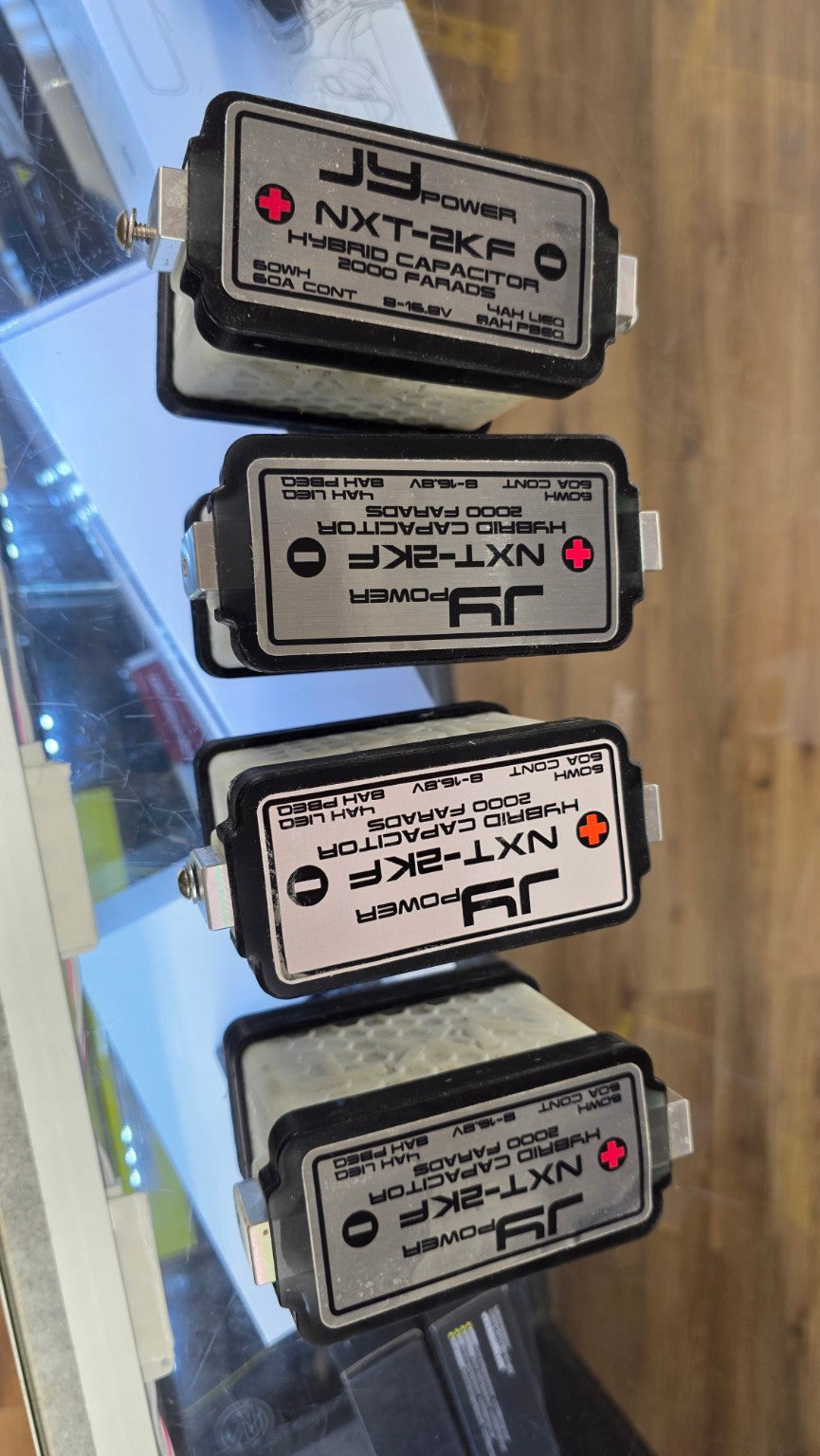 JY Power NXT-2KF V1 hybrid capacitor labels showing 2000 farads
