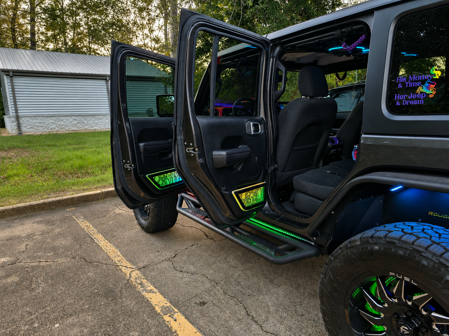 Lit FX custom engraved LED door-panel pocket delete four-piece set installed on a Jeep Wrangler JL Unlimited