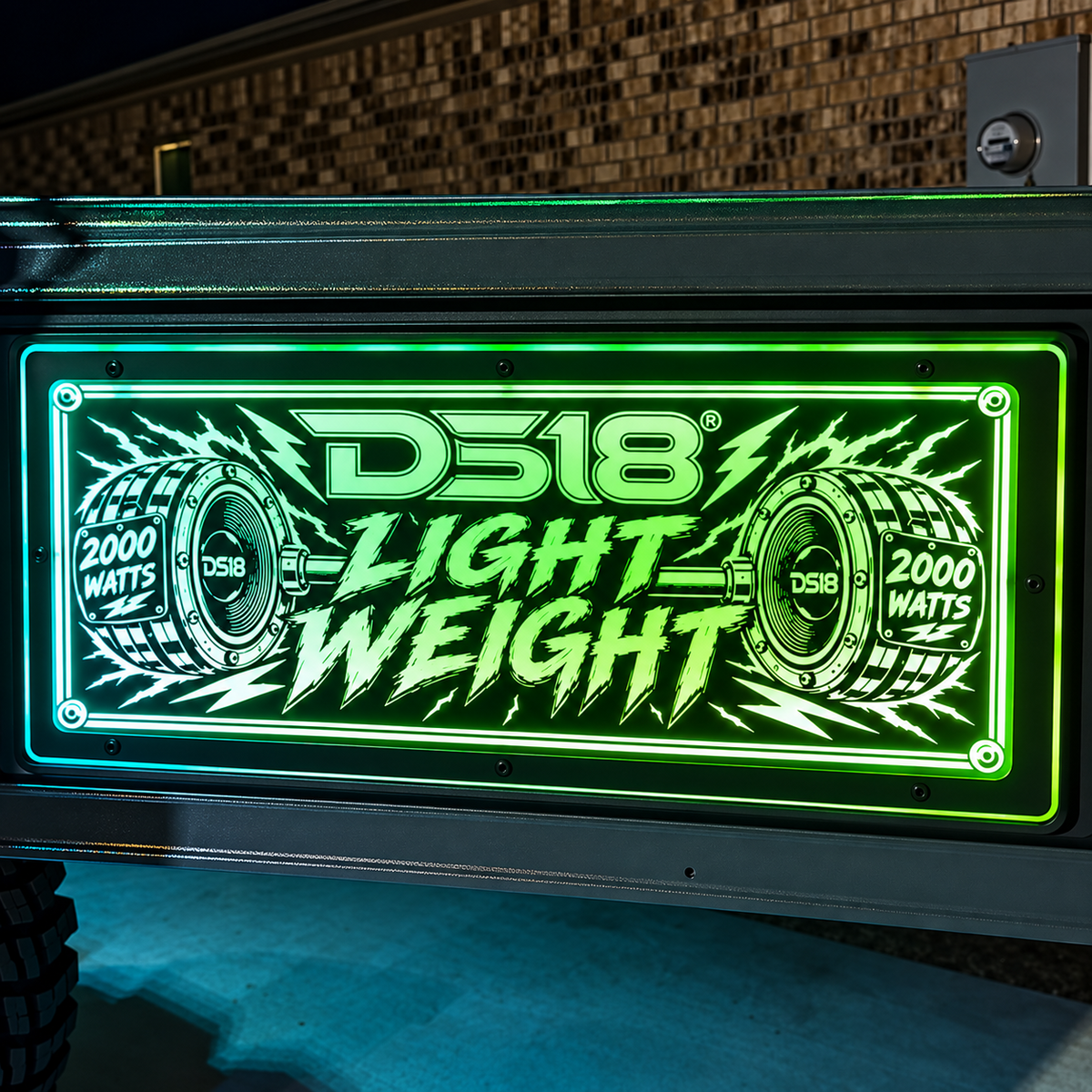 Lit FX Jeep Wrangler tailgate plaque with custom DS18 Light Weight artwork and green cyan RGB LEDs