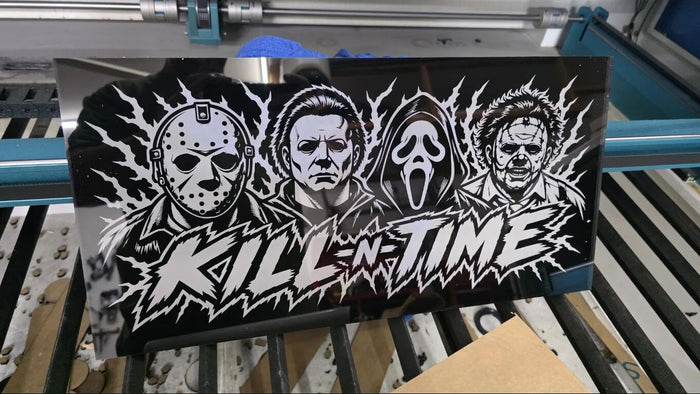 Finished painted-black engraved acrylic panel with Kill N Time artwork