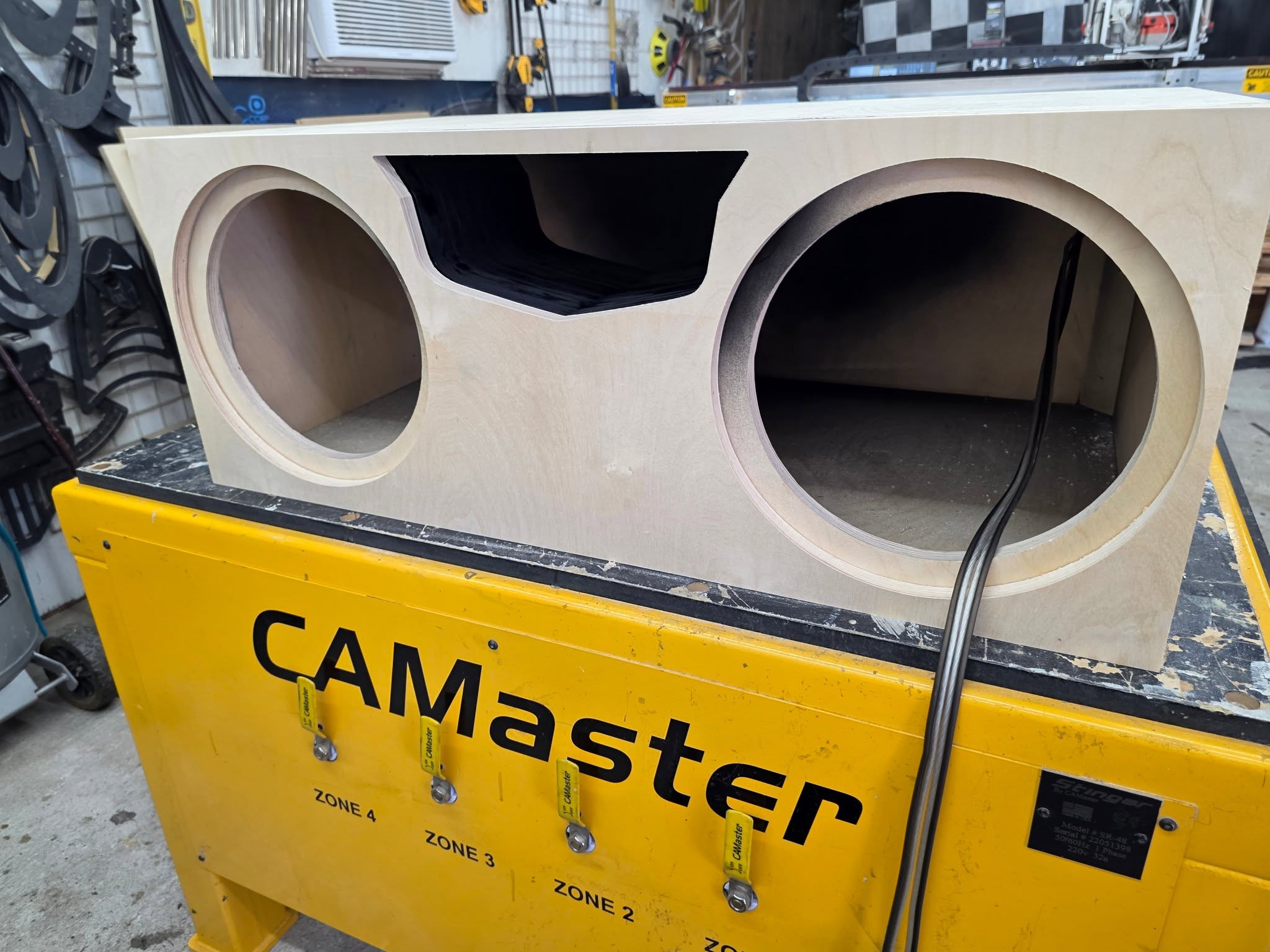 Cadillac custom enclosure for two KICKER CompQ 12-inch subwoofers by SMS Car Audio
