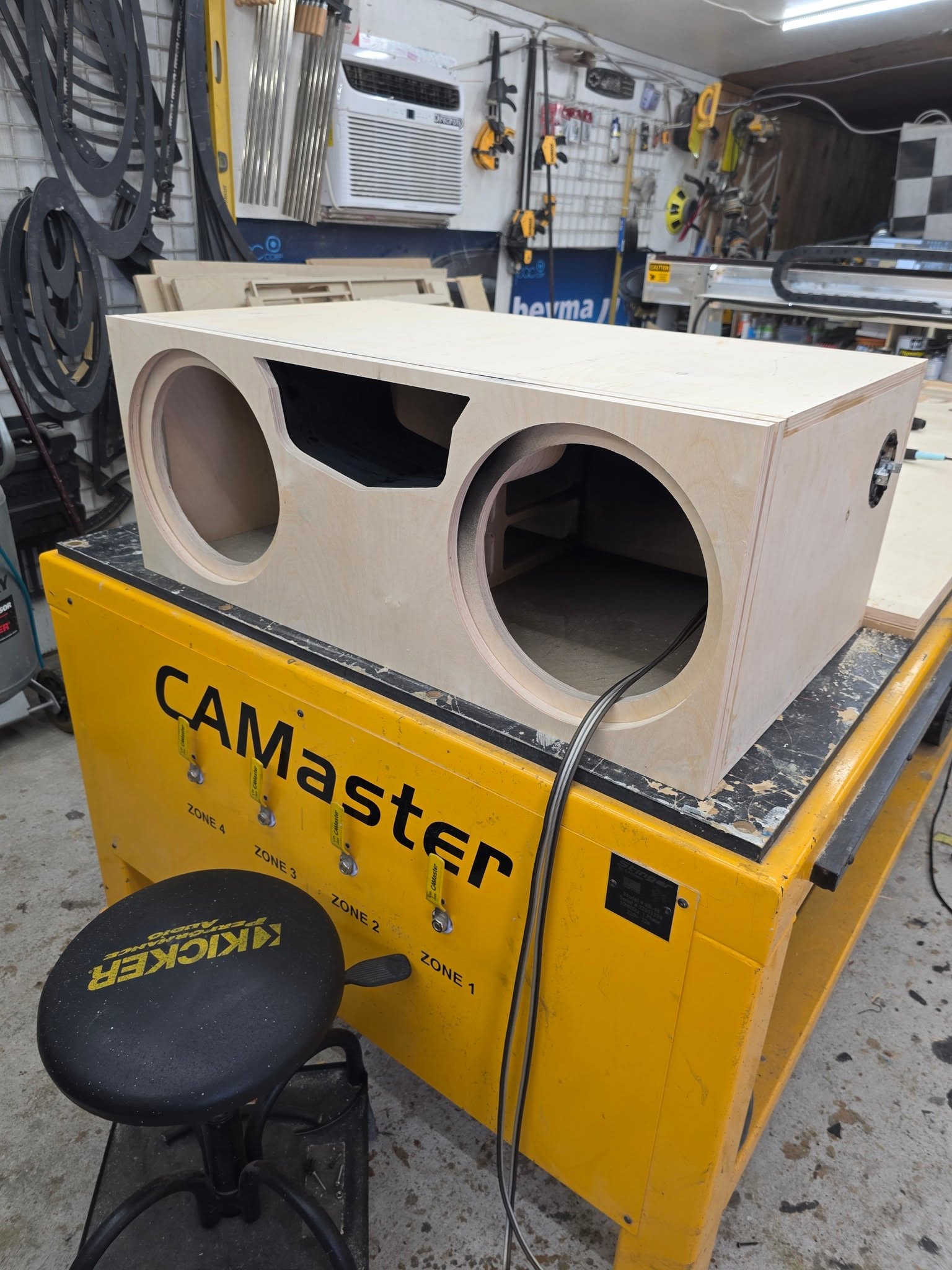 Cadillac-inspired port for dual KICKER CompQ 12-inch custom enclosure by SMS Car Audio