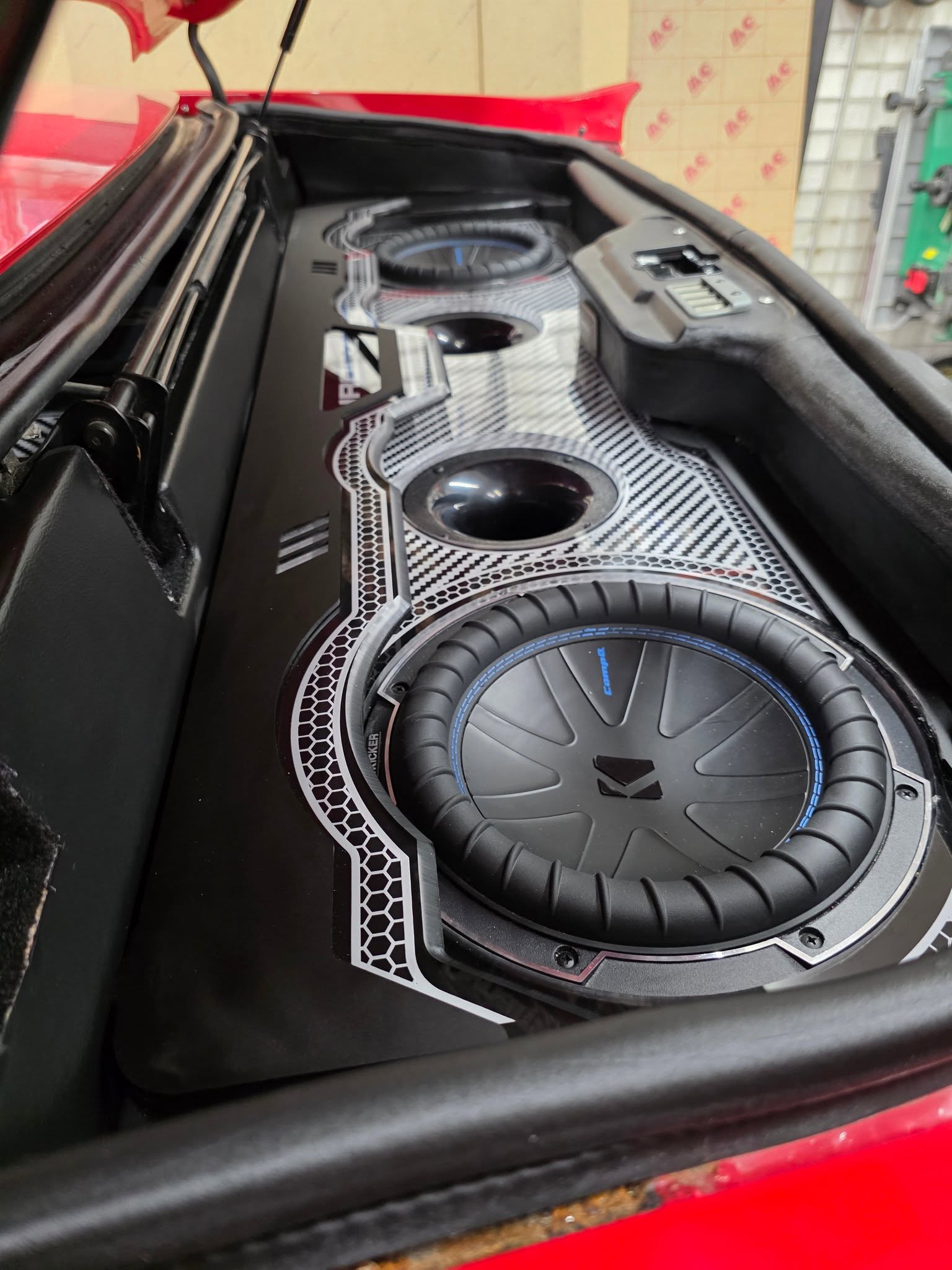 Chevy Camaro Convertible IROC trunk build with dual KICKER CompQ 10-inch subwoofers by SMS Car Audio