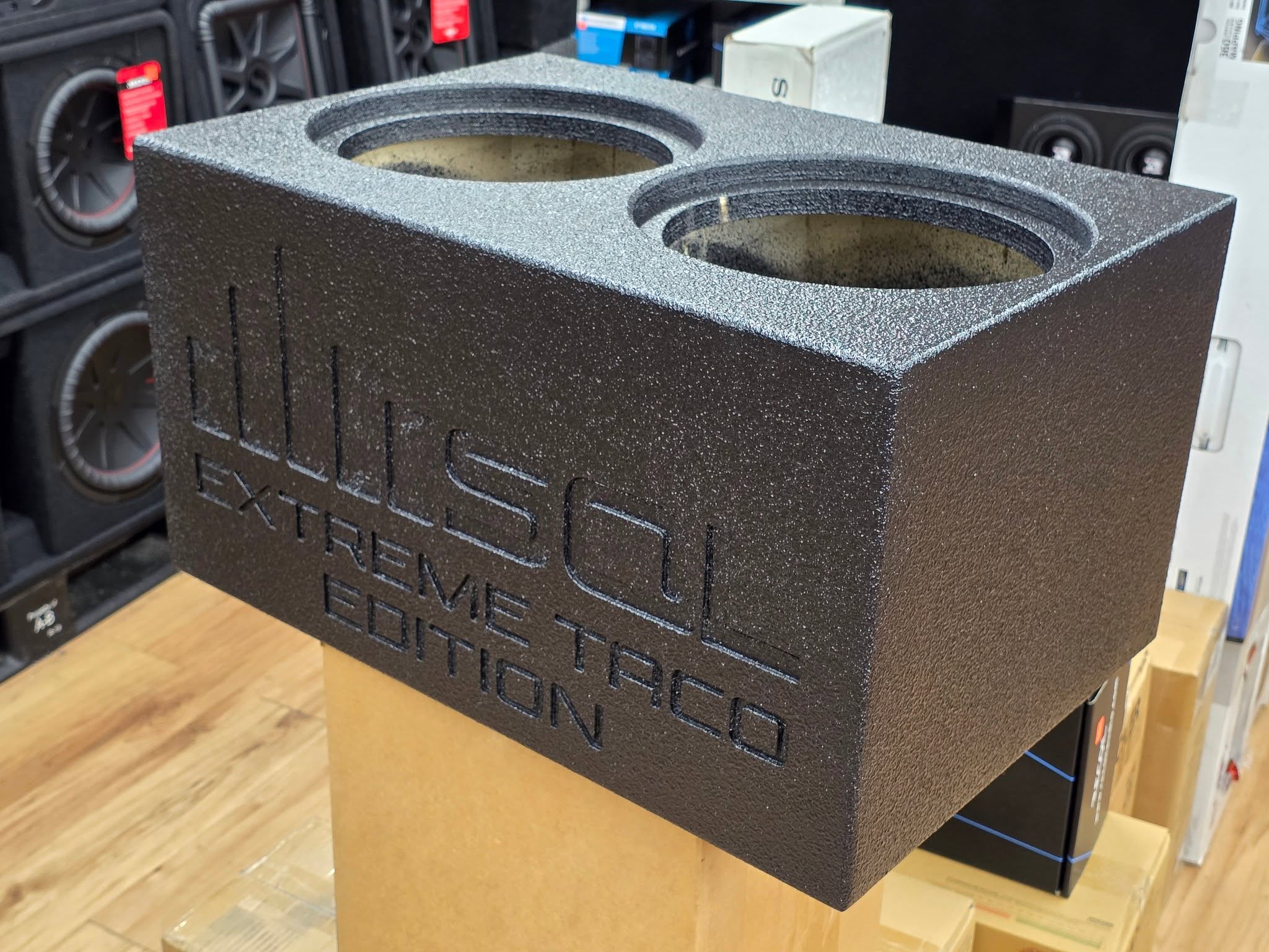 Sealed dual 10-inch SQL-style enclosure with liner and CNC engraving by SMS Car Audio