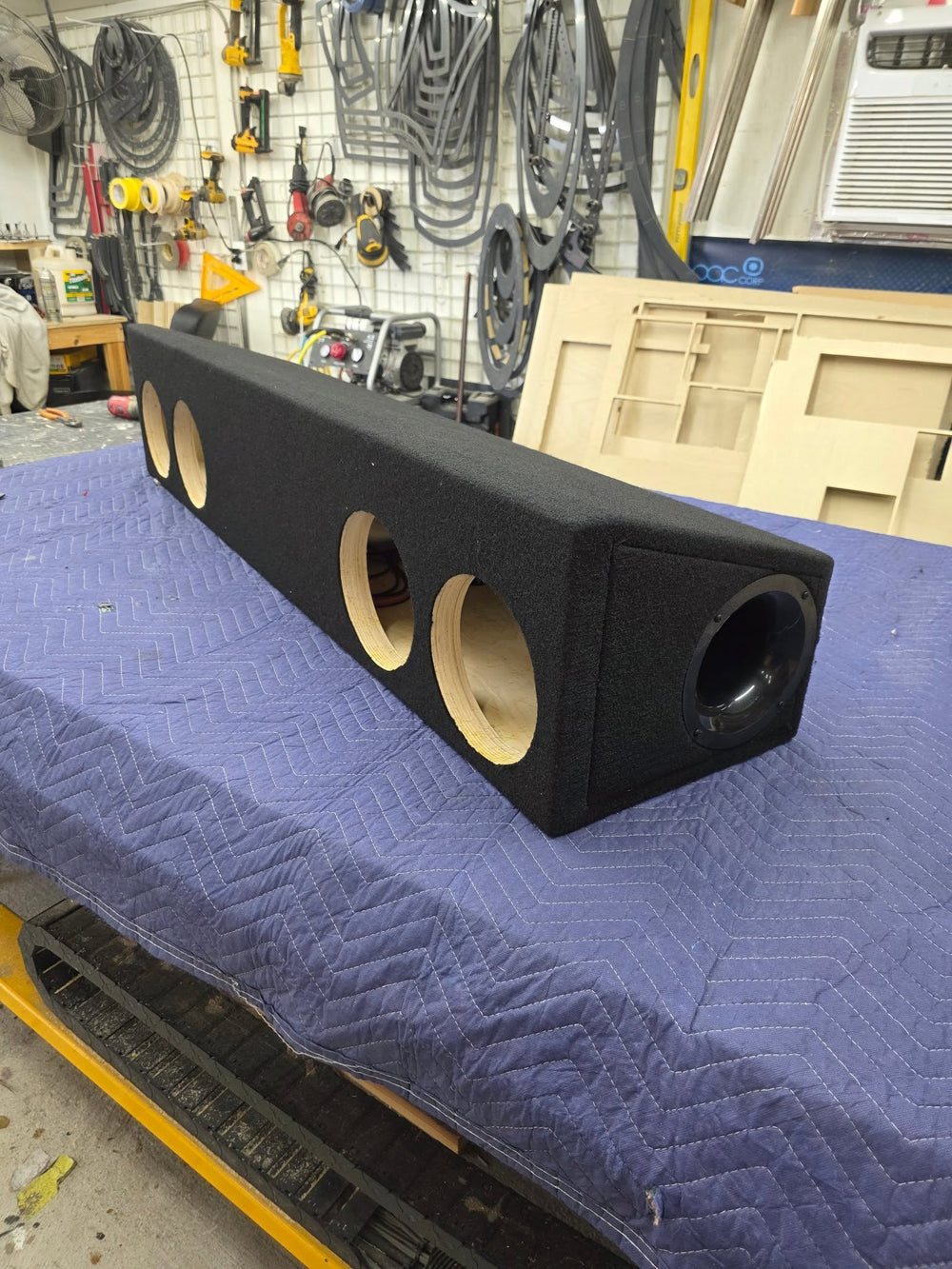 SMS Precision Ford F-150 four 8-inch underseat subwoofer enclosure requiring seat lift